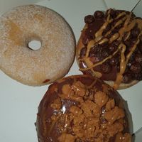 2 filled donuts and a sugar donut at Boogie Donuts in Munich