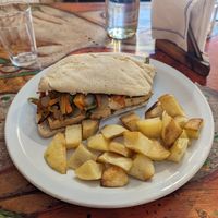 Sandwich de tofu y papas al horno (horrible) at Orden Natural Cafe Veggie in Buenos Aires
