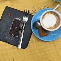 Vegan brownie and caffè macchiato with soy milk and vegan biscotto  at Vegamore in Milan