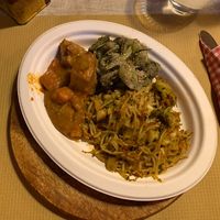 Lunch plate: noodles, greens and seitan stew €11  at Vegamore in Milan