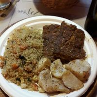 piatto con quinoa e tofu artigianale, daikon gratinato e medaglioni di cereali misti at Vegamore in Milan