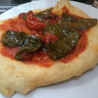 Antipasti: fried pizza with green peppers and tomatoes  at Osteria Casa Pepe in Trieste