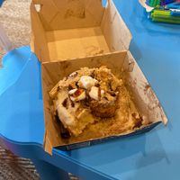 Couldn't wait to take a photo. This is the s'mores one. So good!  at Cinnaholic in Chicago