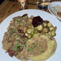 Thanksgiving feast: moist and flavorful jackfruit turkey & buttery mashed potatoes covered in a perfectly salted gravy. Some of the best Brussels sprouts I’ve had. (seasonal)   at Pura Vita in Redondo Beach