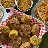 Family chicken bucket with Cajun fries and mac&cheese   at Don't be Chick'n in San Jose