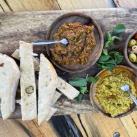 Olives, bread and zucchini and couscous pesto   at Rainarai in Rotterdam