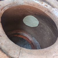 Bread in the oven at Al Ameen for Foul & Tamees الأمين للفول والتميس in Maan