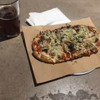 Vegan special , vio life , seiten pepperoni and sausage ,,,w beer  at The Guardian Brewing Co in Muncie