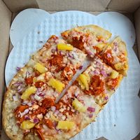 Vegan build your own.  Vegan pepperoni, pineapple, onion, vegan cheese at The Guardian Brewing Co in Muncie