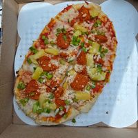 Vegan build your own.  Vegan pepperoni, pineapple, green pepper, vegan cheese at The Guardian Brewing Co in Muncie