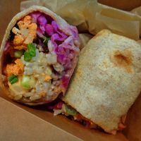 Buffalo Cauliflower Wrap.
Buffalo cauliflower, brown rice, pickled cabbage, scallions, tahini ranch, whole wheat wrap. vegan. at Chardon Buckeye Chocolate Café in Chardon
