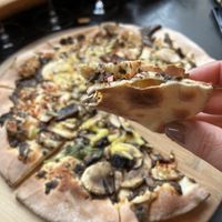 Mushroom pizza with vegan cheese  at Tombolo Freycinet in Apslawn