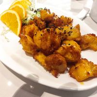 Fried monkey head mushrooms with orange sauce and black sesame seeds at Heartful Veggie 從心素食 in New Territories