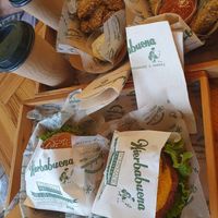 Bacon cheese burger + frenchy burger, onion rings, and crispy avocado 🥑 at Hierbabuena Vegan in Buenos Aires