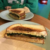 Half of a toastie (mushroom, tomato, hash brown)   at Gloria in Brunswick