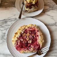 Cinnamon roll with pistachio crème and raspberry crème bun   at Baja Wegańska Cukiernia in Warsaw