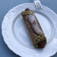 Cannoli with raspberries and pistachio cream  at Baja Wegańska Cukiernia in Warsaw