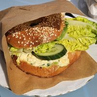 Tofu scramble bagel at Baja Wegańska Cukiernia in Warsaw