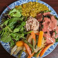 Wild brown rice, sauteed butternut squash with carrot, daikon, green bean, green split pea with onion and carrot, steamed collard, green kale with brown and shiitake mushroom beet  at Shangri-la Buddha in Albany