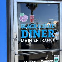 “Vegan friendly” sign on the door  at Black & Blue Diner in Las Vegas