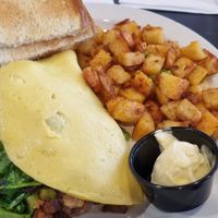 Omelette with steak, home fries and toast + butter at Black & Blue Diner in Las Vegas