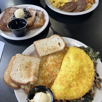 Breakfast with pancakes and sausage patties, and omelette with streak bits and hash browns   at Black & Blue Diner in Las Vegas