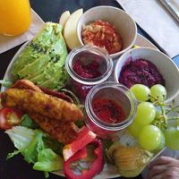 Vegan breakfast with tempeh, red beet spread, hummus, and extra avocado (not included) at Das Nest in Mainz