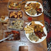 Take away at home. Veg spring rolls, ginger mock duck, Chinese olive fried rice,  spicy chicken,  three veg. at Happy Family Restaurant  in Tecoma