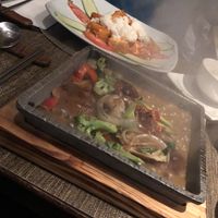 Shiitake mushrooms bulgogi! And some spicy buffalo tofu in the background!  at Franchia Vegan Cafe in New York City