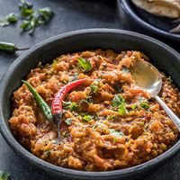Baigan bharta a dish made with grilled eggplant chopped in Indian gravy. at Barbecue Palace Indian in Cuenca