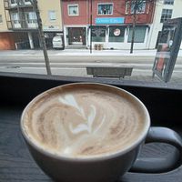 Latte with view on the street at Maloca Coffee & Food in Bodo