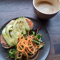 Maloca special toast with vegan Salami and latte at Maloca Coffee & Food in Bodo