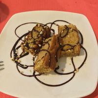 Orange cake 💚 at Loving Hut in Madrid