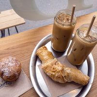 Berliner, almond croissand and iced coffee at Bakery Bakery - Länggasse in Bern