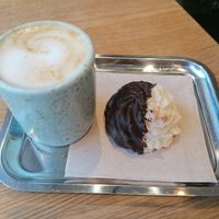 Cappuccino and koko macaron at Bakery Bakery - Länggasse in Bern