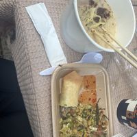Khao soi, laphet, pad see ew, and fried spring rolls   at Vegan Society in Chiang Mai