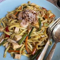 Stir fried noodles with curry  at Vegan Society in Chiang Mai