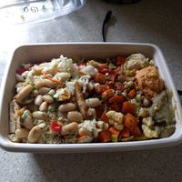 A Mediterranean vegan bowl. Three dips, rice, veggies, pita crisps, and a ton of other options. at Olive Oil Grille in Camp Hill