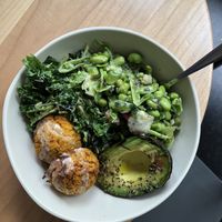 avacado bowl with kale salad and snap pea salad. Added yam falafel  at Tractor Foods in Victoria
