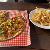 Tandoori mushroom pizza and fries   at Moeraki Tavern in Moeraki