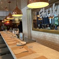 Seating at bar at Shuka in New York City