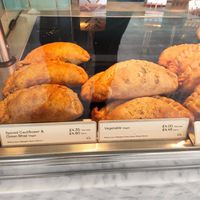 A few Cornish pasties and sweet options. Spiced cauliflower pasty was delicious 😋 at Cornish Bakery in Fowey