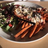 Eggplant Parma with vegan ‘Follow Your Heart’ cheese, sweet potato fries and salad at Port Campbell Hotel in Port Campbell