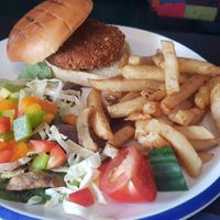 Vegan chicken burger with chips and salad at The Top House in Filey