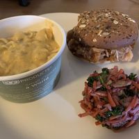 Green chili Mac n cheeze, cole slaw, and JackBeQue classic sandwich at JackBeQue in Englewood