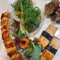 Vegan dragon roll, chewy inari, tofu nigiri, onion nigiri  at Kamakura Japanese Cuisine in Seattle
