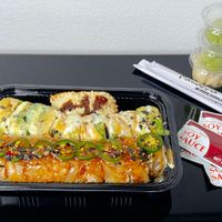 crunch inari, avocuddle roll, jalaspicy roll (takeout) at Kamakura Japanese Cuisine in Seattle