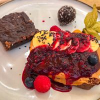 Tahini bar, energy ball and nutty banana bread topped with homemade peanut butter and jam  at Breens Deli in Mallorca