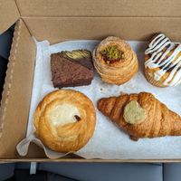 Cheese Danish, brownie, cherry pistachio cruffin, hazelnut chocolate croissant, and cinnamon roll muffin at SPLIT Bakehouse in La Mesa