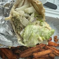 falafel supreme without tomato + sweet potato fries   at Royal Grill 37 in Toms River